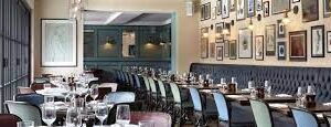 Dining room has flat access wooden floor and well lit