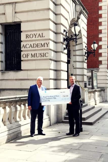 Paul Mounsey, Dir. of BBS, Presenting a Very Large Cheque of The BBS MIX Proceeds to The Royal Academy of Music