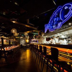 Dark Cavernous Bar & Restaurant Providing Theatre as Well as Good Food