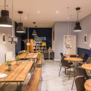Caya Club Workspace, you can sit for £2ph (or £15 per day/£180 per month) with free coffee. There's a Coffee Shop at The Front