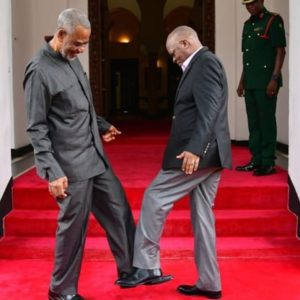 Even Politicians are Foot Shaking to Avoid the Virus - Tanzanian President John Magufuli (right) greets opposition politician Maalim Seif Sharif Hamad (left) by tapping their feet together Tanzanian President John Magufuli (right) greets opposition politician Maalim Seif Sharif Hamad (left) by tapping their feet together