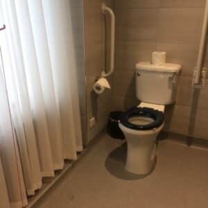 Disabled Toilet With one vertical grab rail